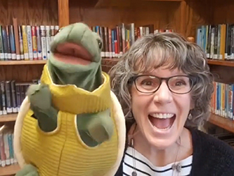 librarian with puppet